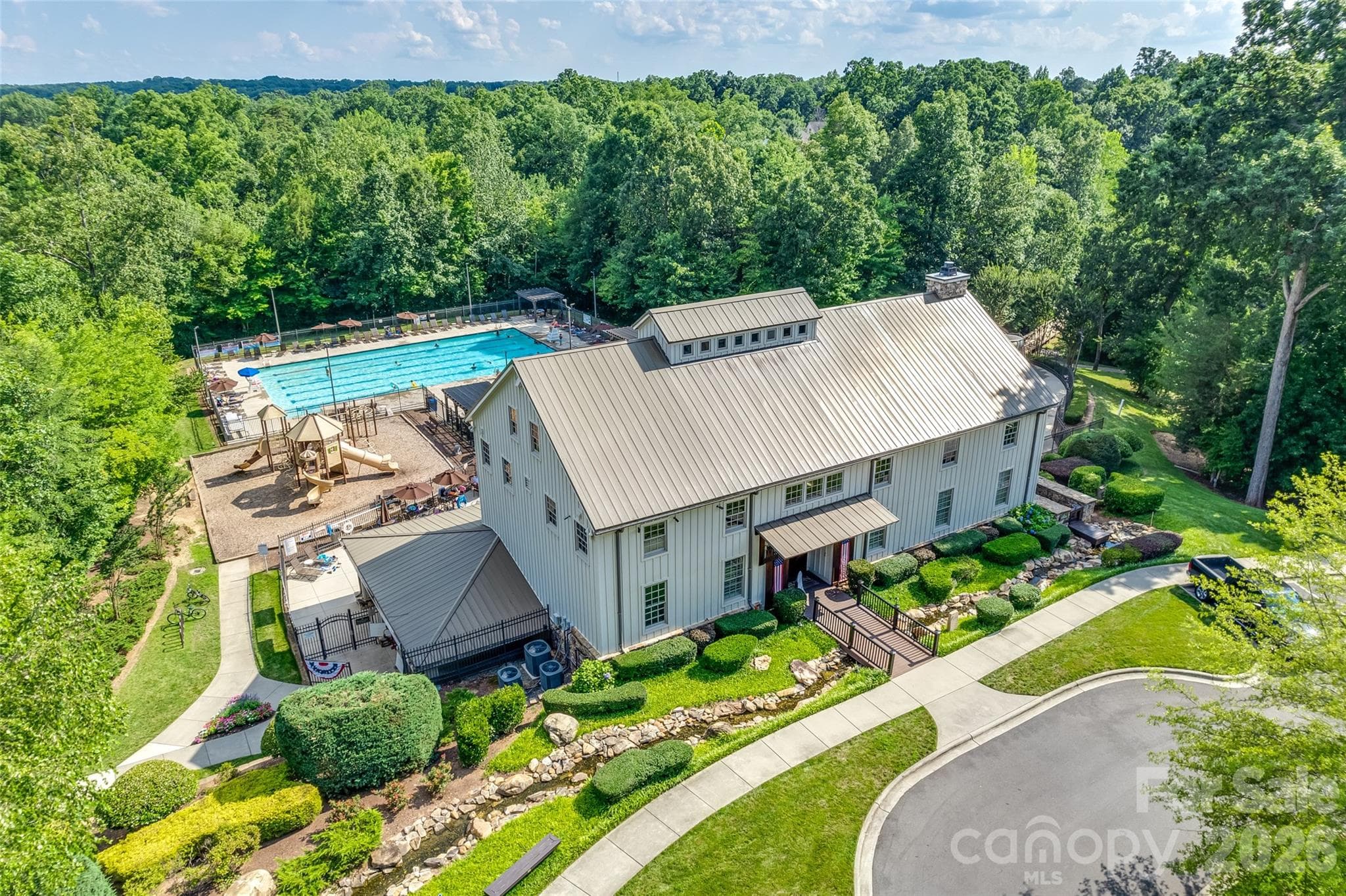 The Millhouse has pools, waterslides, playground and fitness center - 2209 Trading Ford Drive, Waxhaw
