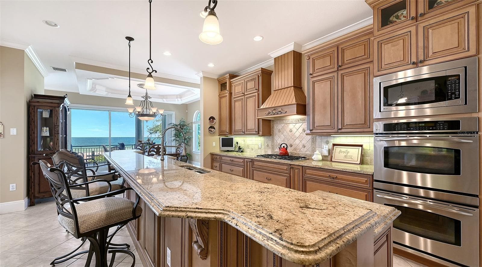 Gulf waters are always in view while you're preparing meals or enjoying them. - 106 74TH ST #100, HOLMES BEACH