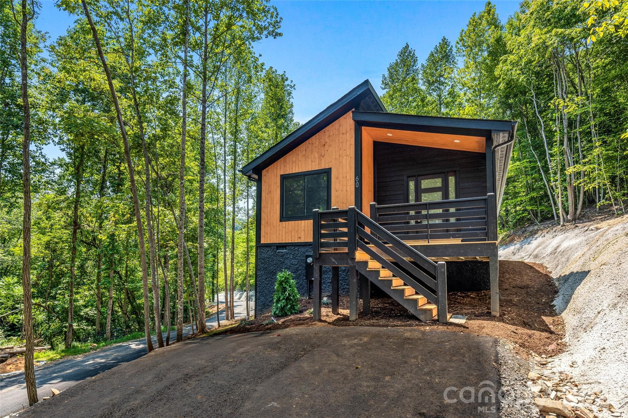 Contemporary cabin exterior - 60 Catatoga Trail, Marion
