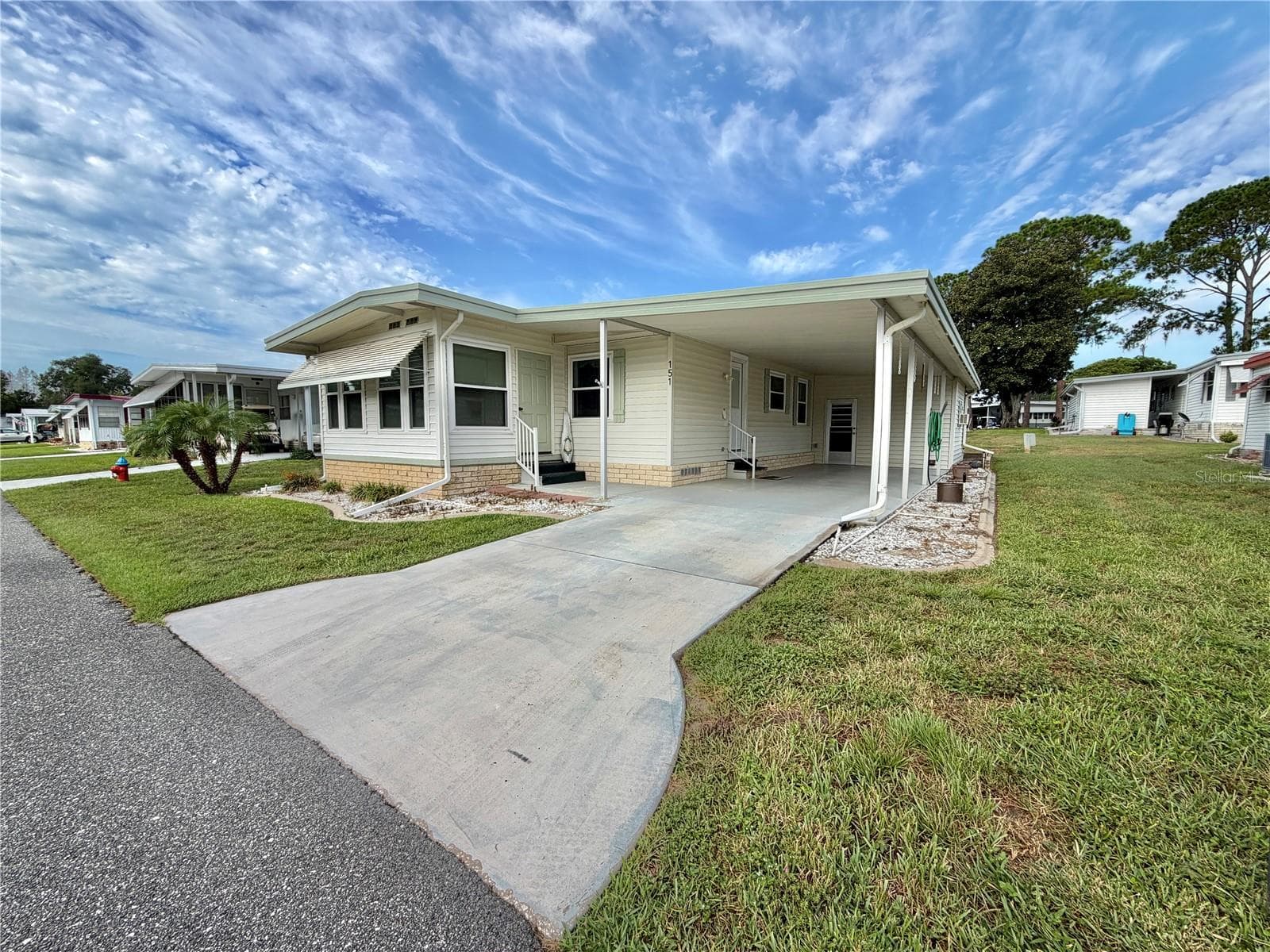 Manufactured Home at 151 HIBISCUS WAY, LEESBURG, photo 52 of 56