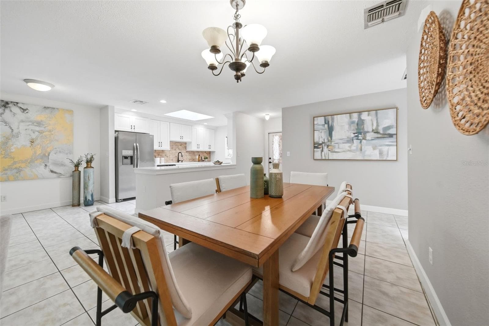 Open concept formal dining room. - 1540 E HORATIO AVE, MAITLAND