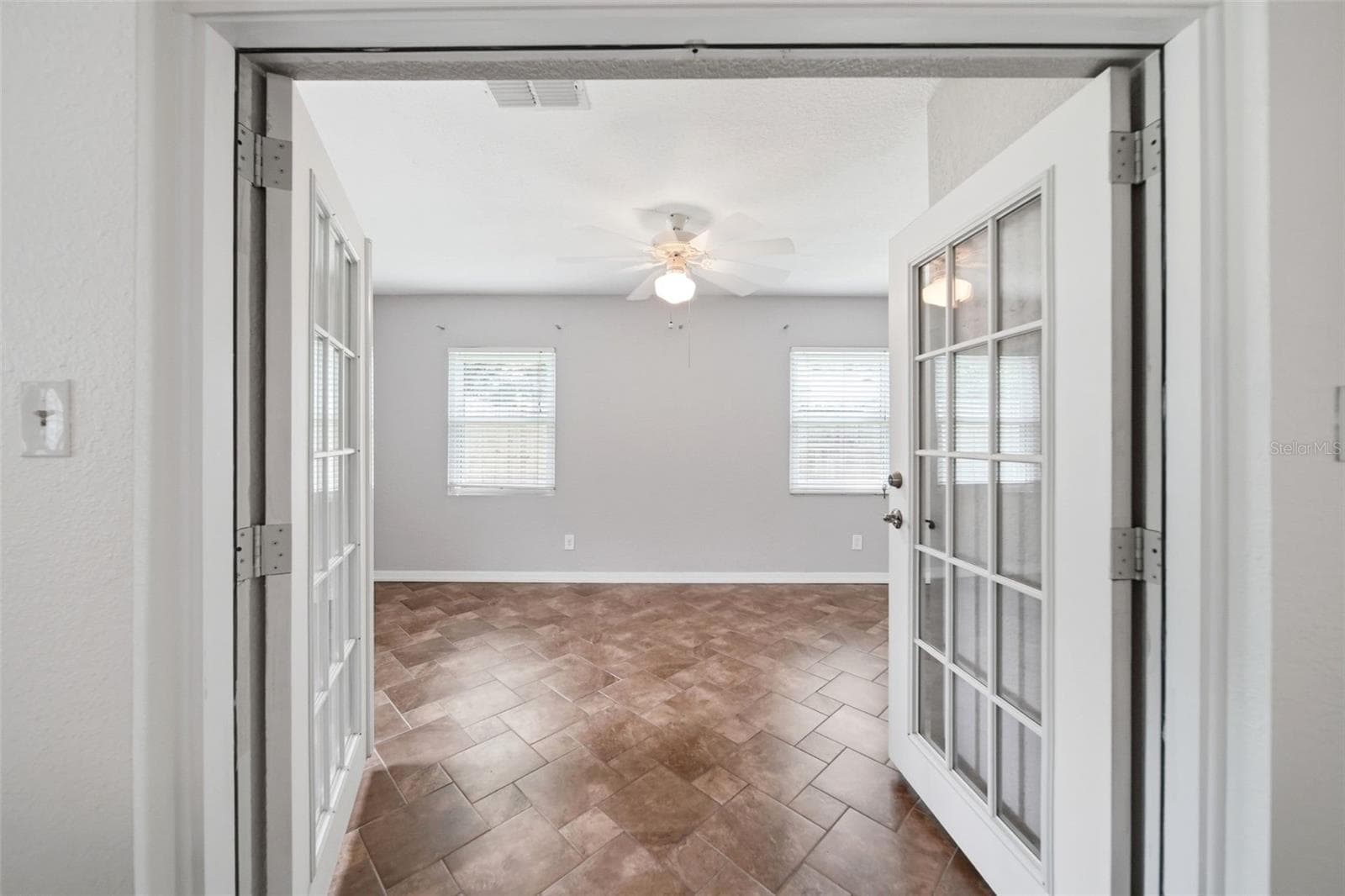 Enclosed patio | bedroom space | bonus room | flex space | home office - 1540 E HORATIO AVE, MAITLAND