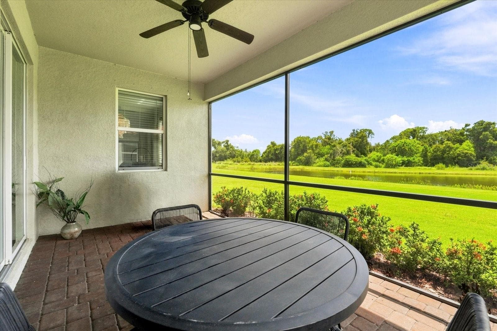 SCREENED LANAI - 2528 STARWOOD CT, LAKEWOOD RANCH
