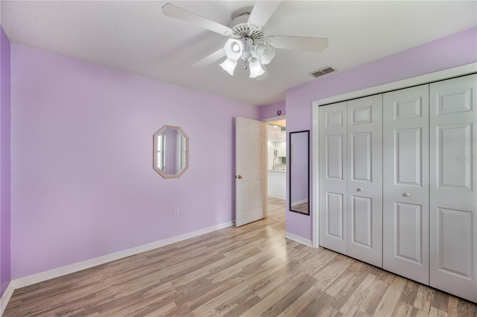 Guest Bedroom 3, laminate and built in closet - 1660 GAMEWELL TRL, LAKELAND