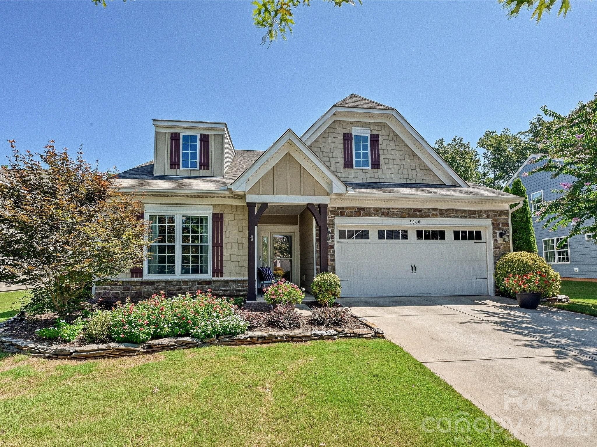 4-Bedroom Home with Fiber Cement Exterior Enhanced with Stone Accents - 5060 Big Bend Drive, Lancaster