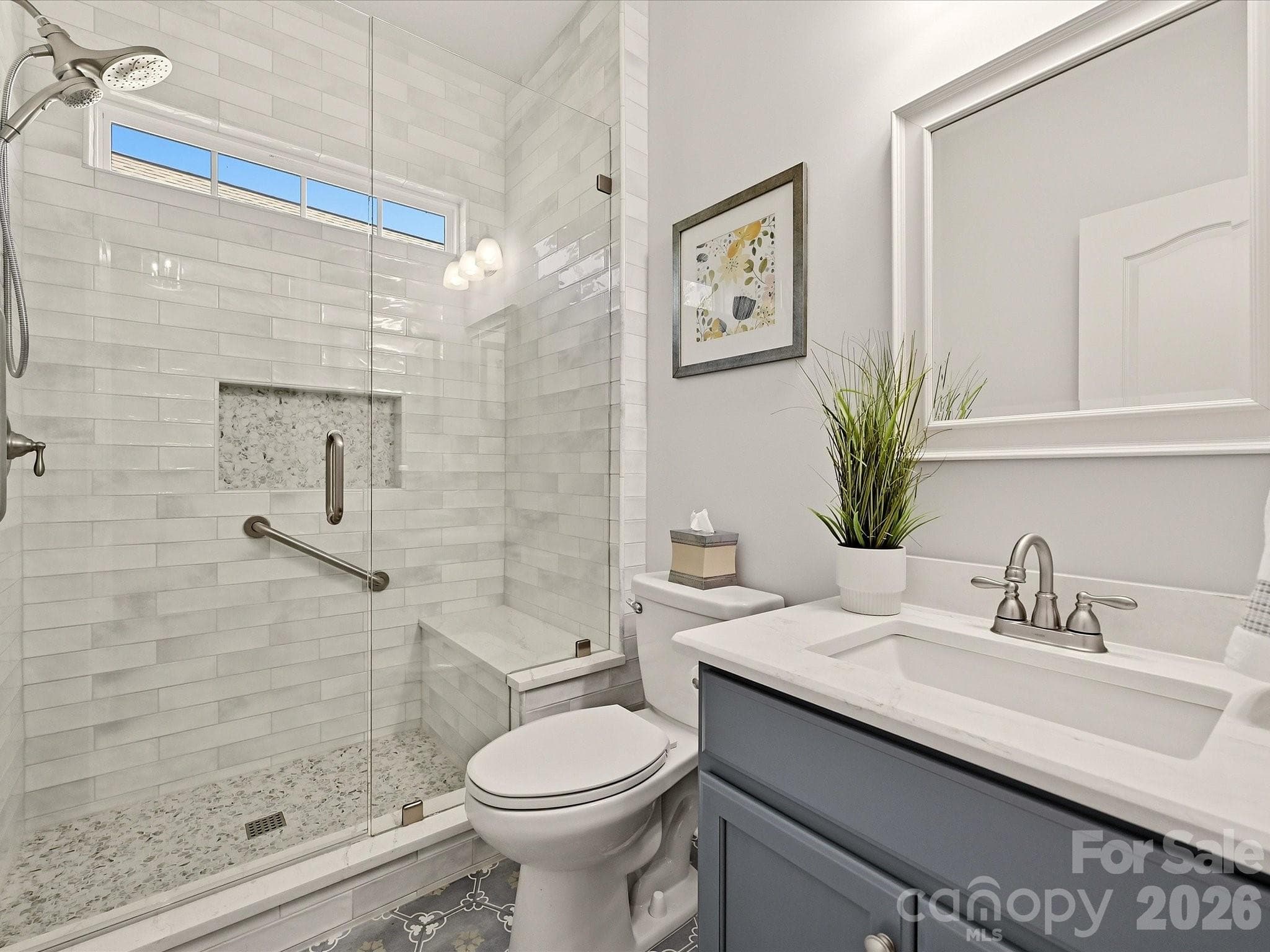 Remodeled Full Bath 2 w/ Designer Tiled Surround & Flooring, New Showerhead system, Custom Tiled Niche, Farmeless Door, New Tiled Flooring, Framed Mirrors, Single bowl sink on Quartz Coutner, and Painted Cabinet - 5060 Big Bend Drive, Lancaster