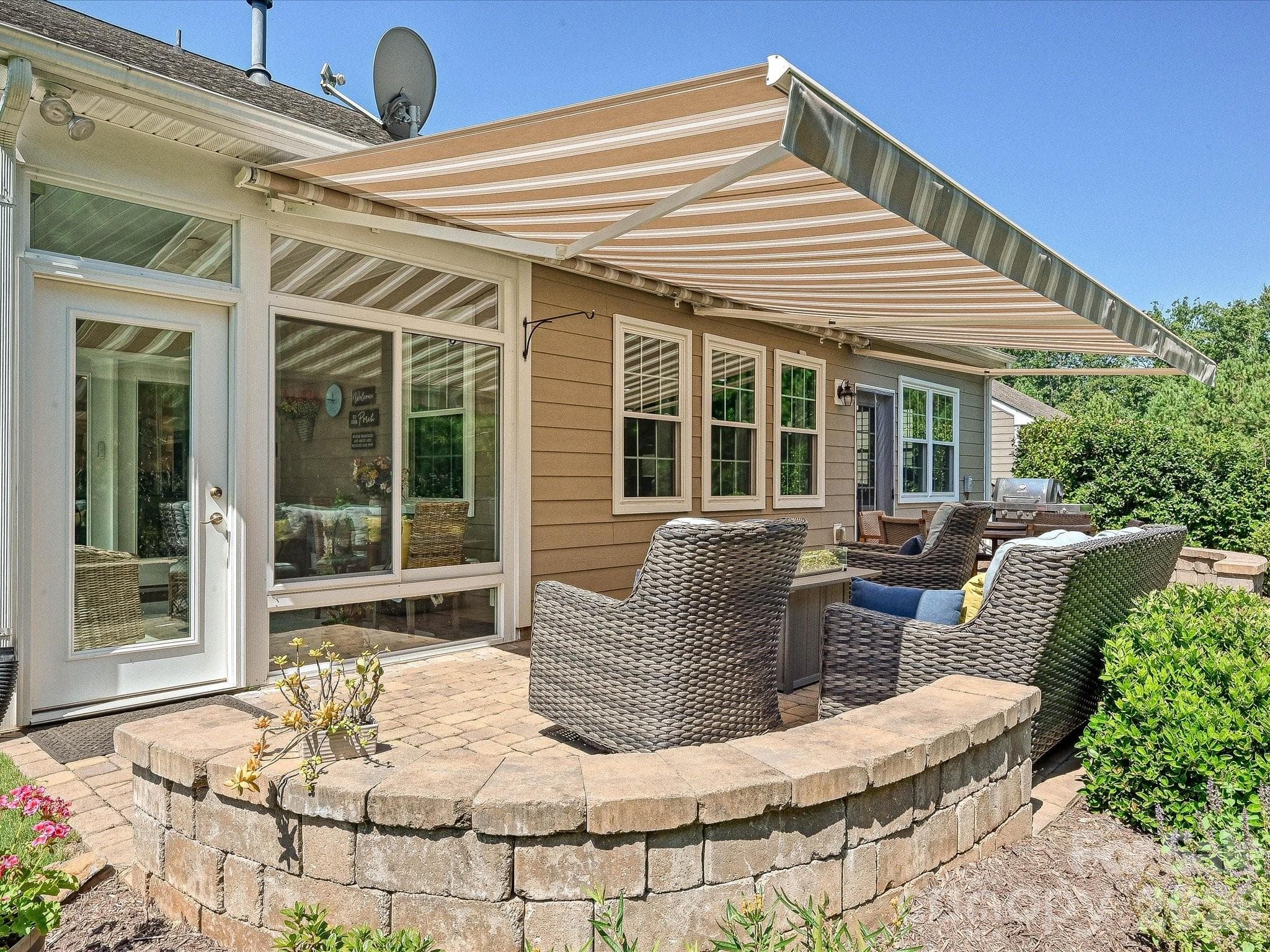 Awning over Patio is 23 Feet! Paver Patio with Two Bench Walls - 5060 Big Bend Drive, Lancaster