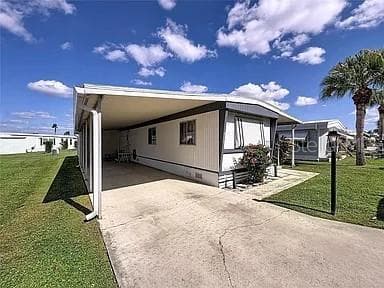 Mobile Home at 213 LAKESIDE RANCH CIR, WINTER HAVEN, photo 3 of 11