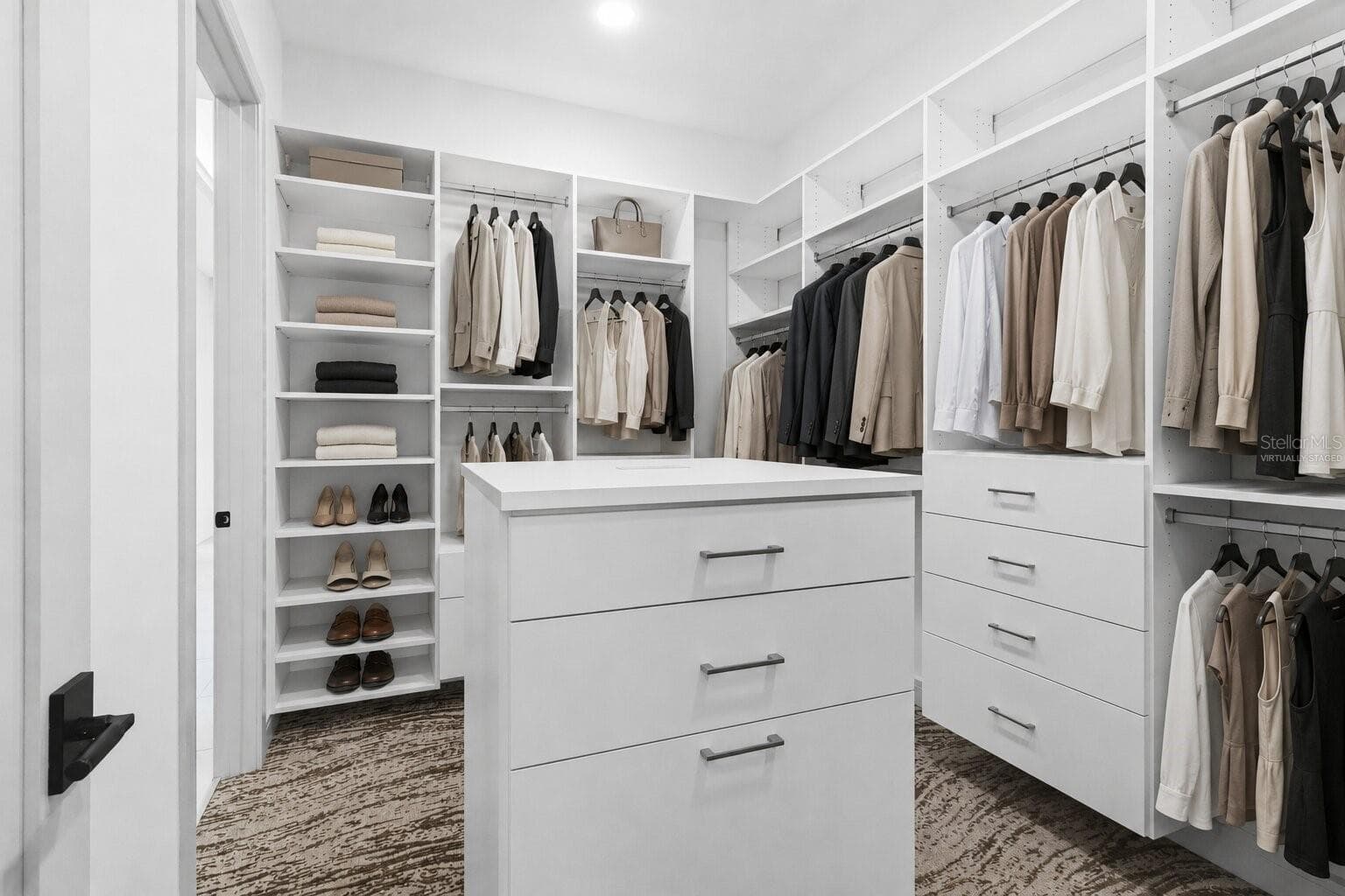 Virtually Staged Image of custom walk-in closet - 104 S MAKI RD, PLANT CITY