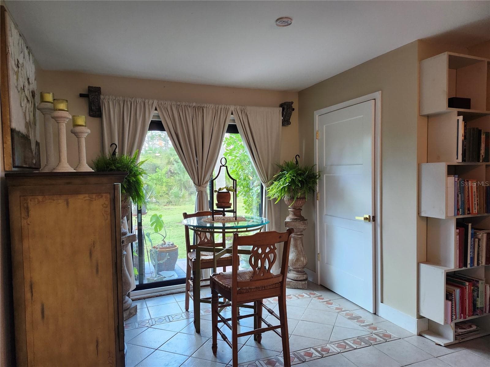 Additional spacer in living room, currently used as a dining area - 87 BOUNDARY BLVD #7, ROTONDA WEST