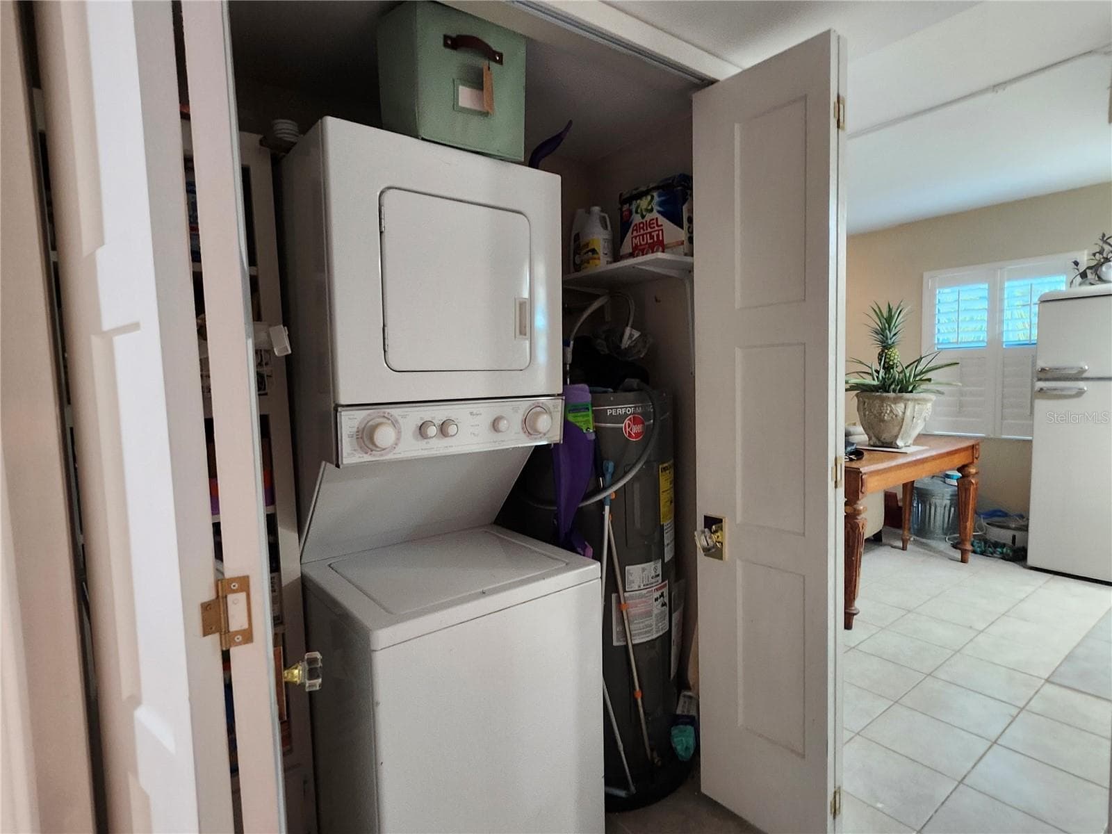 Laundry closet off of bathroom and kitchen - 87 BOUNDARY BLVD #7, ROTONDA WEST