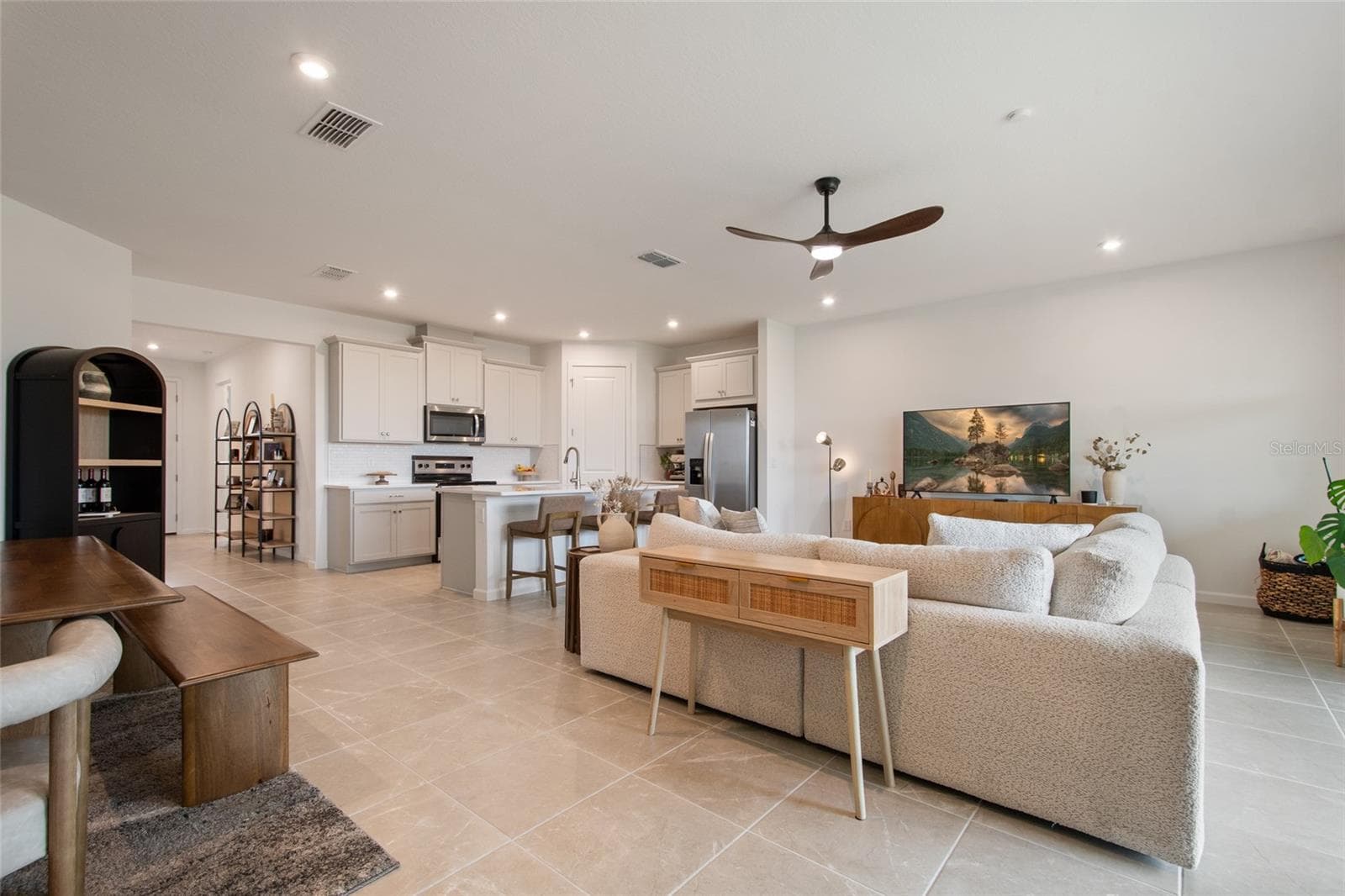 Easy flow with plenty of room surrounding the furniture and naturally identified areas for breakfast, dining and relaxation for movie night! - 2685 SWEET ACACIA DR, CLERMONT