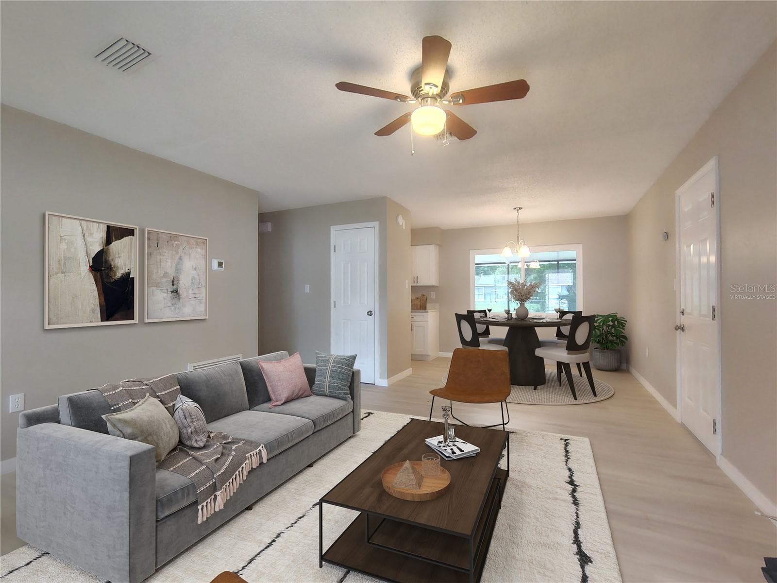 Virtually Staged - Living and Dining Room - 904 HICKORY AVE, FRUITLAND PARK