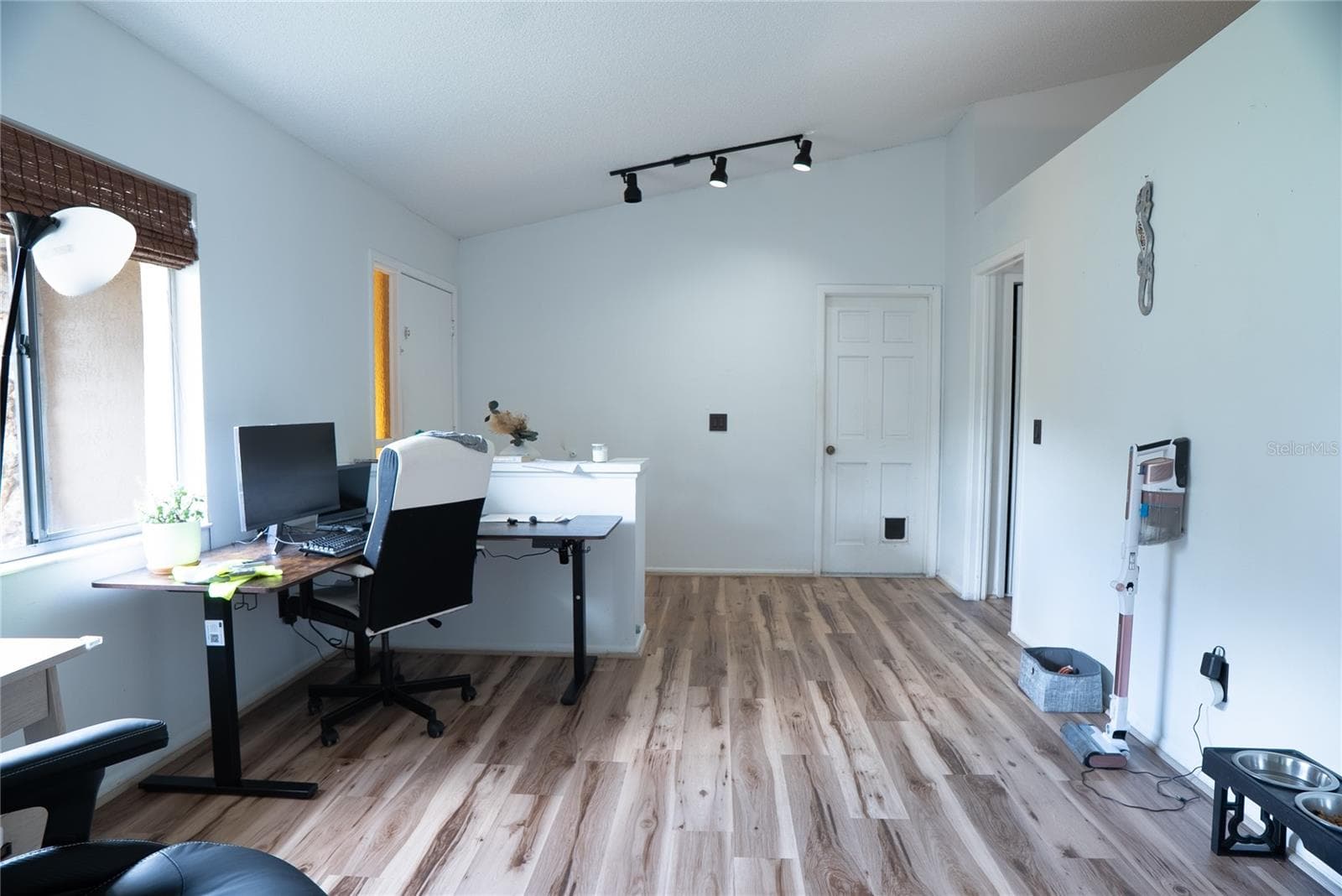 Light-filled entry foyer currently used as a home office - 304 SHADOW OAK DR, CASSELBERRY