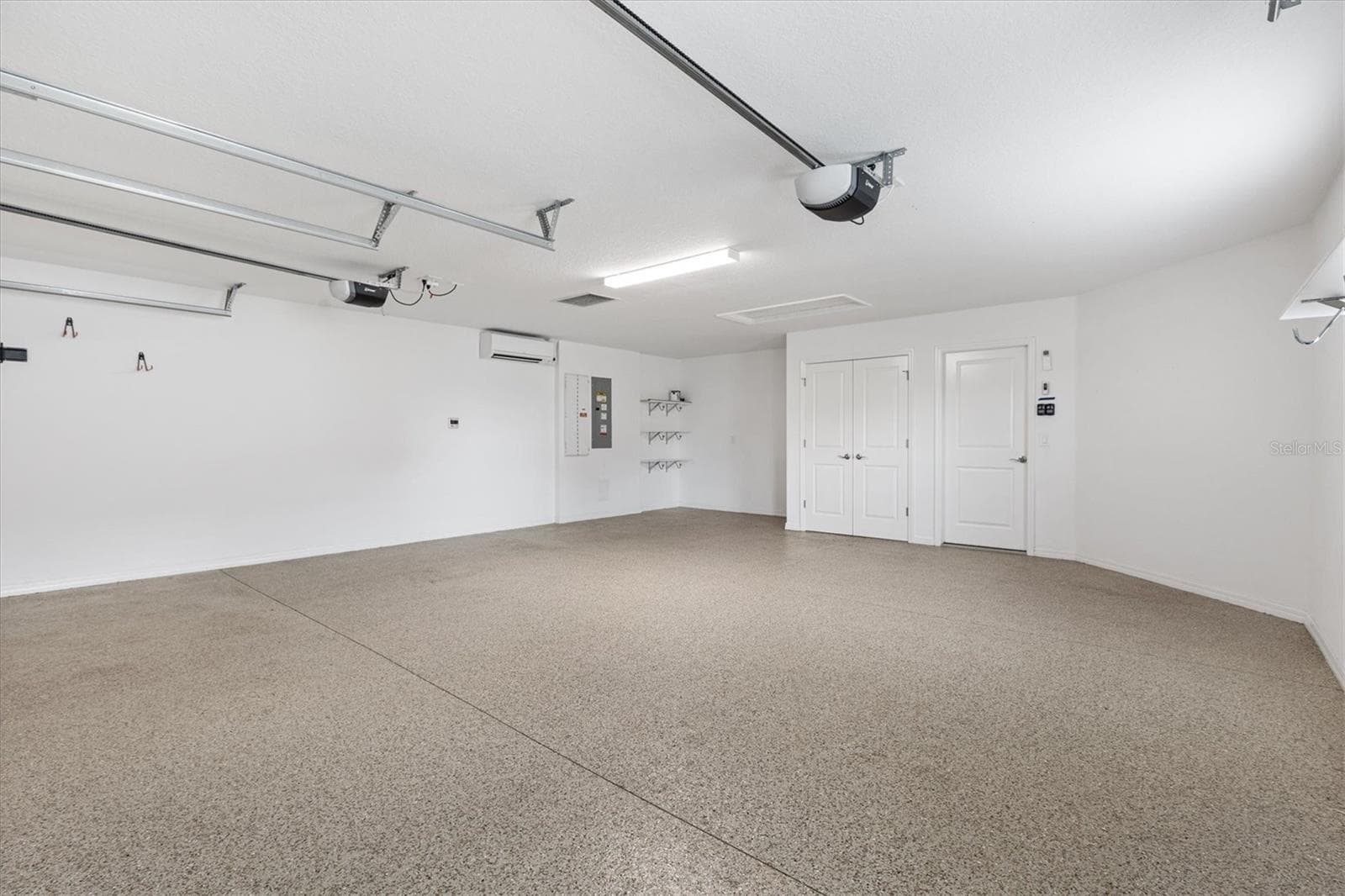 2 car the size of a 2 Car Plus GOLF CART GARAGE - 5805 CAMDYN CT, THE VILLAGES