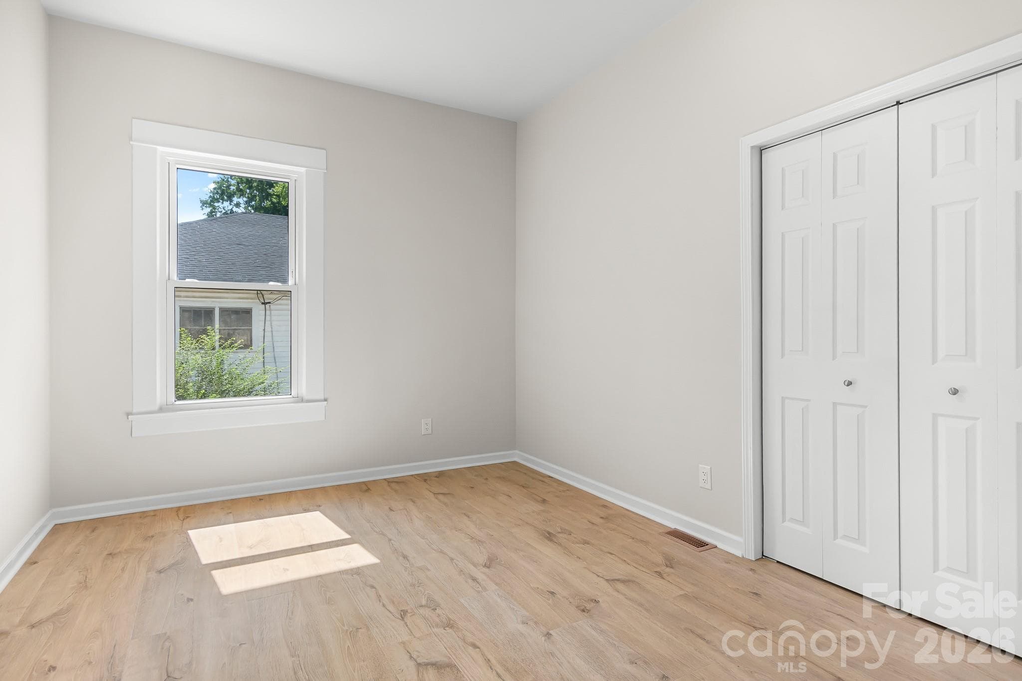 Bright and comfortable third bedroom with natural light. - 104 1st Avenue, China Grove