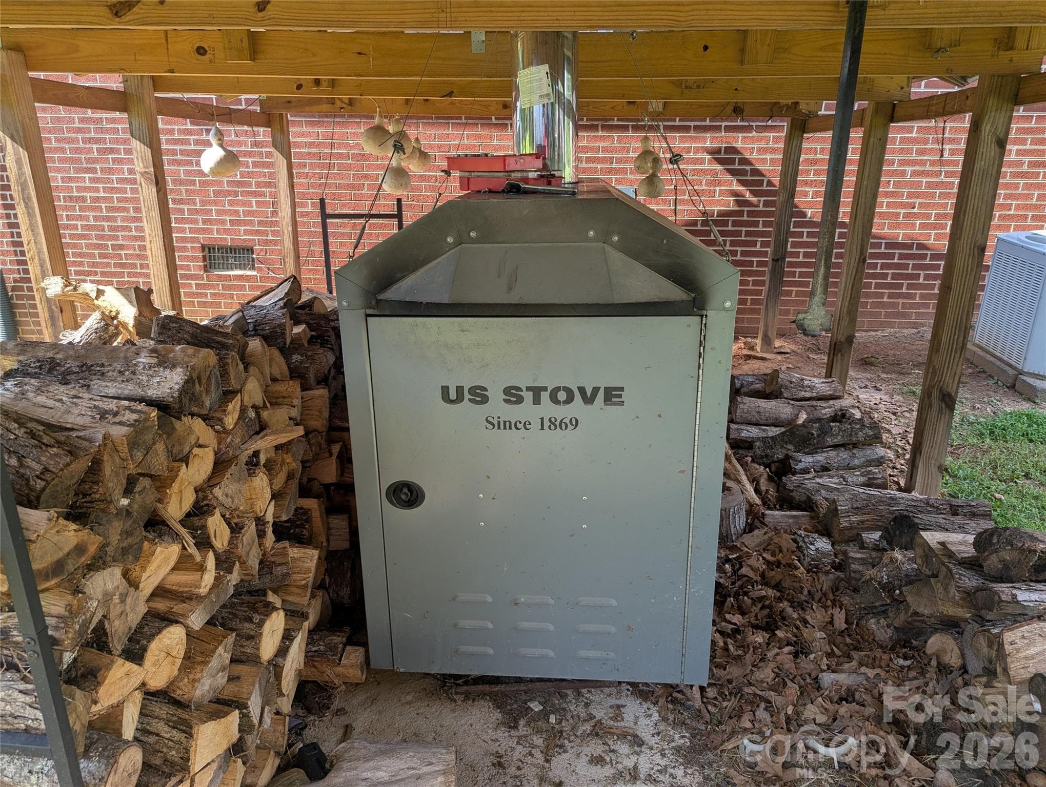 exterior woodstove - 605 Lincoln Lane SW, Lenoir