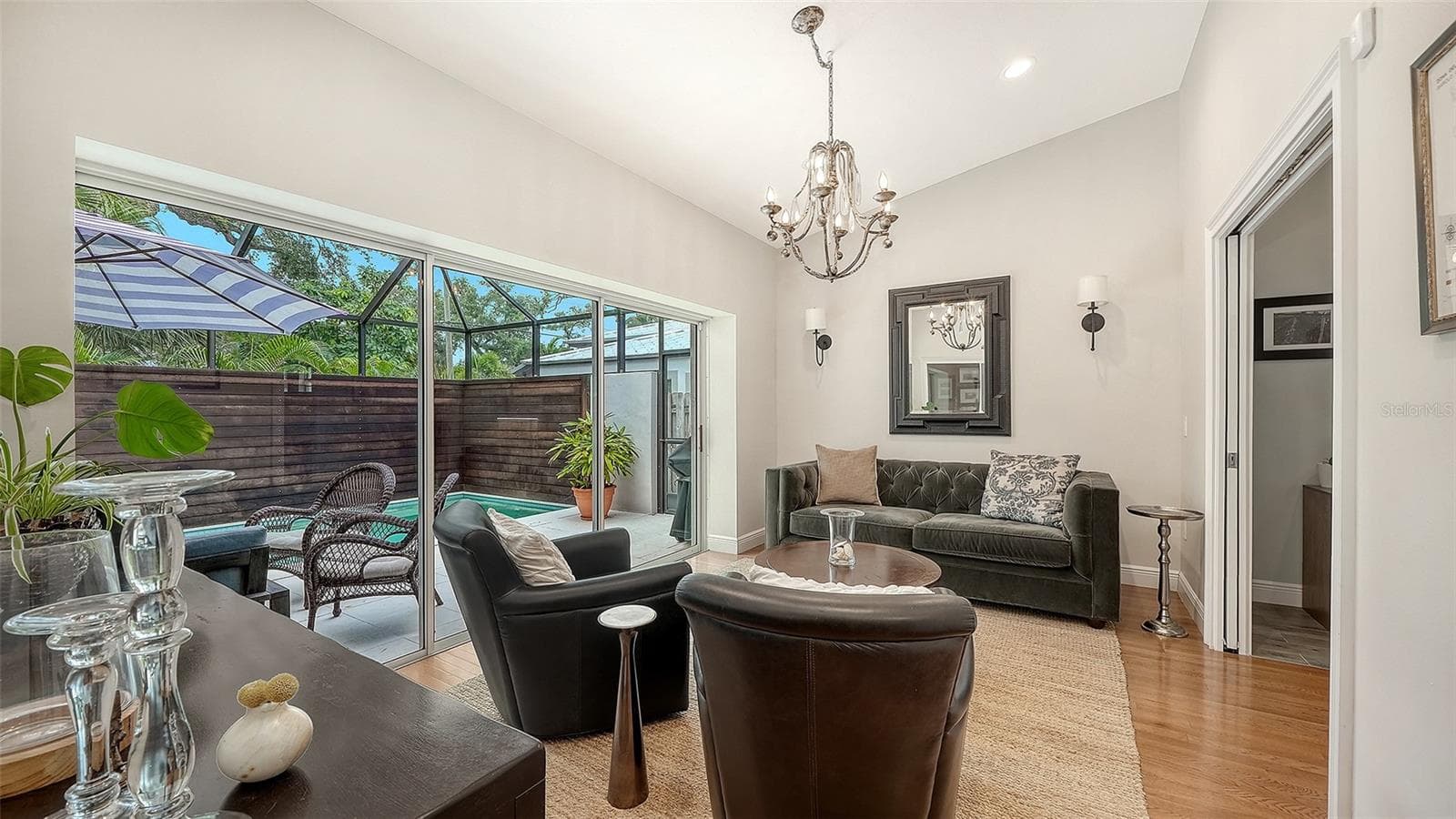 Stylish flex space offers versatility for additional entertaining, dining, or living while maintaining the home’s refined aesthetic. - 1685 6TH ST, SARASOTA