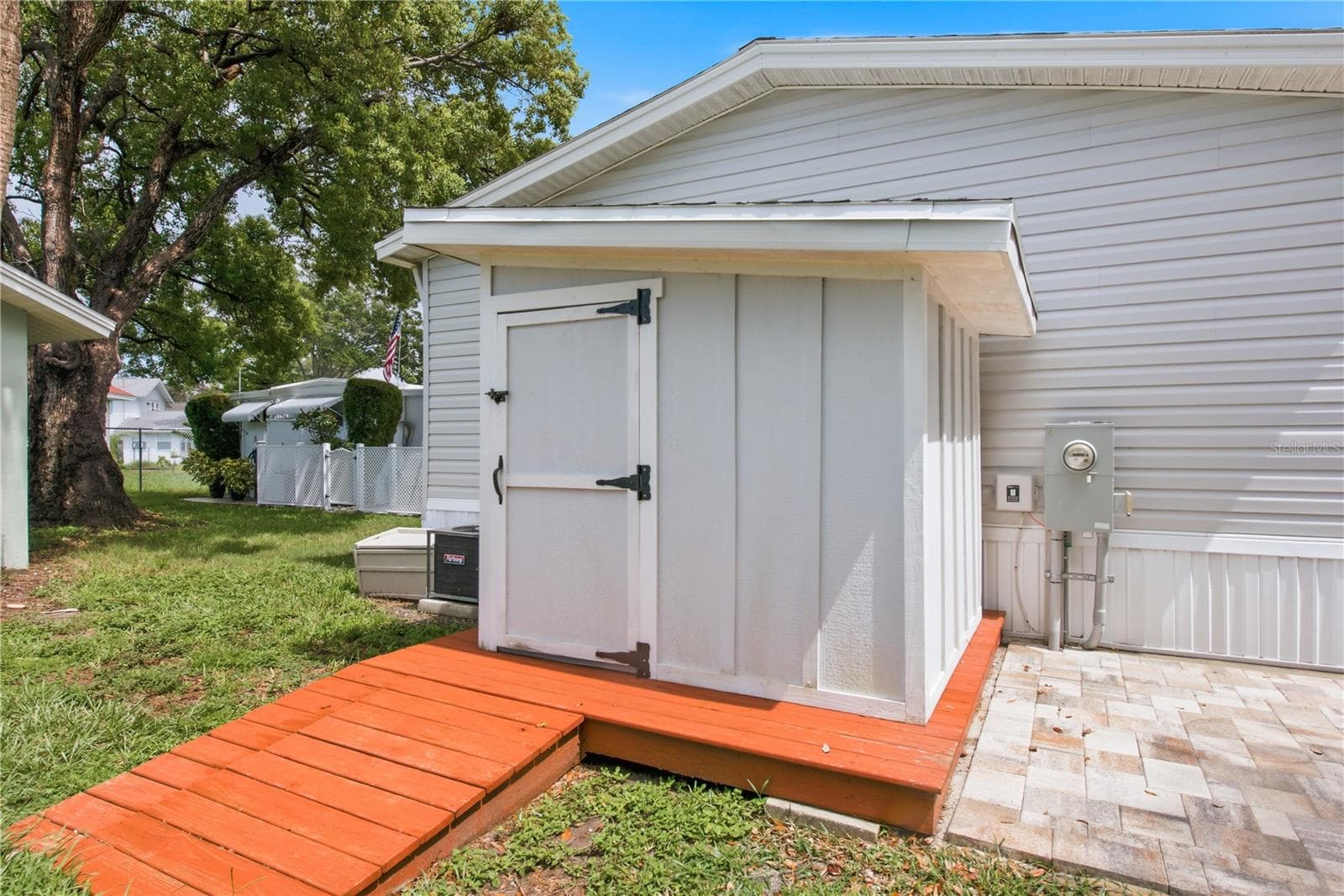 Backyard with storage shed and paver area - 980 7TH ST NW #88, LARGO