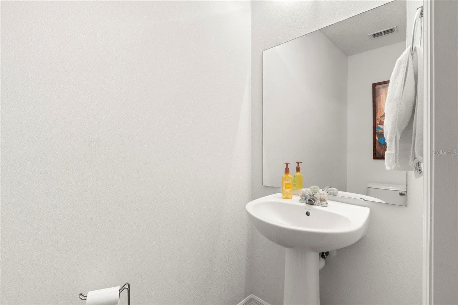 First floor half bath - 2523 SANDY BEACH LN, CLEARWATER