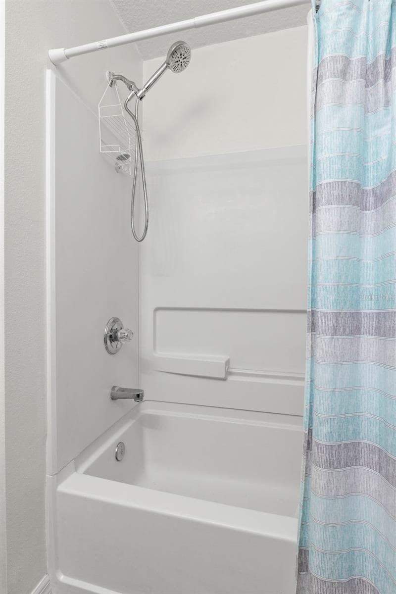 Second bedroom ensuite bath - 2523 SANDY BEACH LN, CLEARWATER