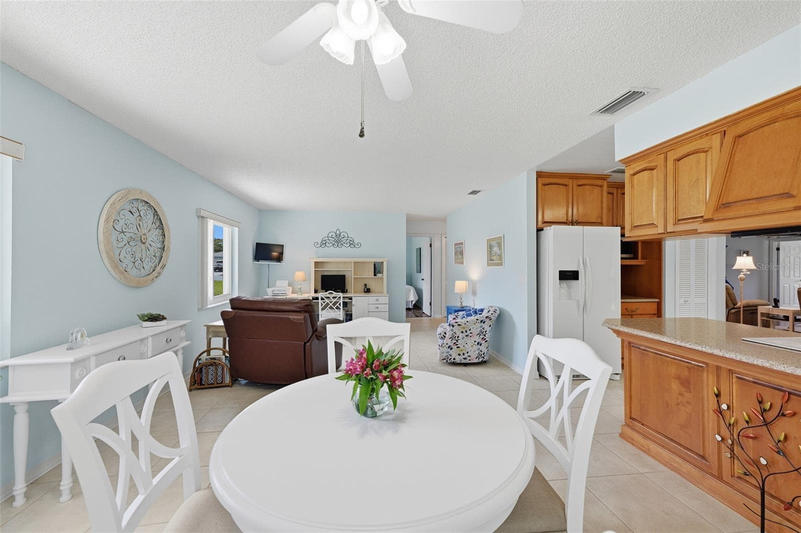 BREAKFAST NOOK AND FAMILY ROOM. - 1803 NEW BEDFORD DR, SUN CITY CENTER