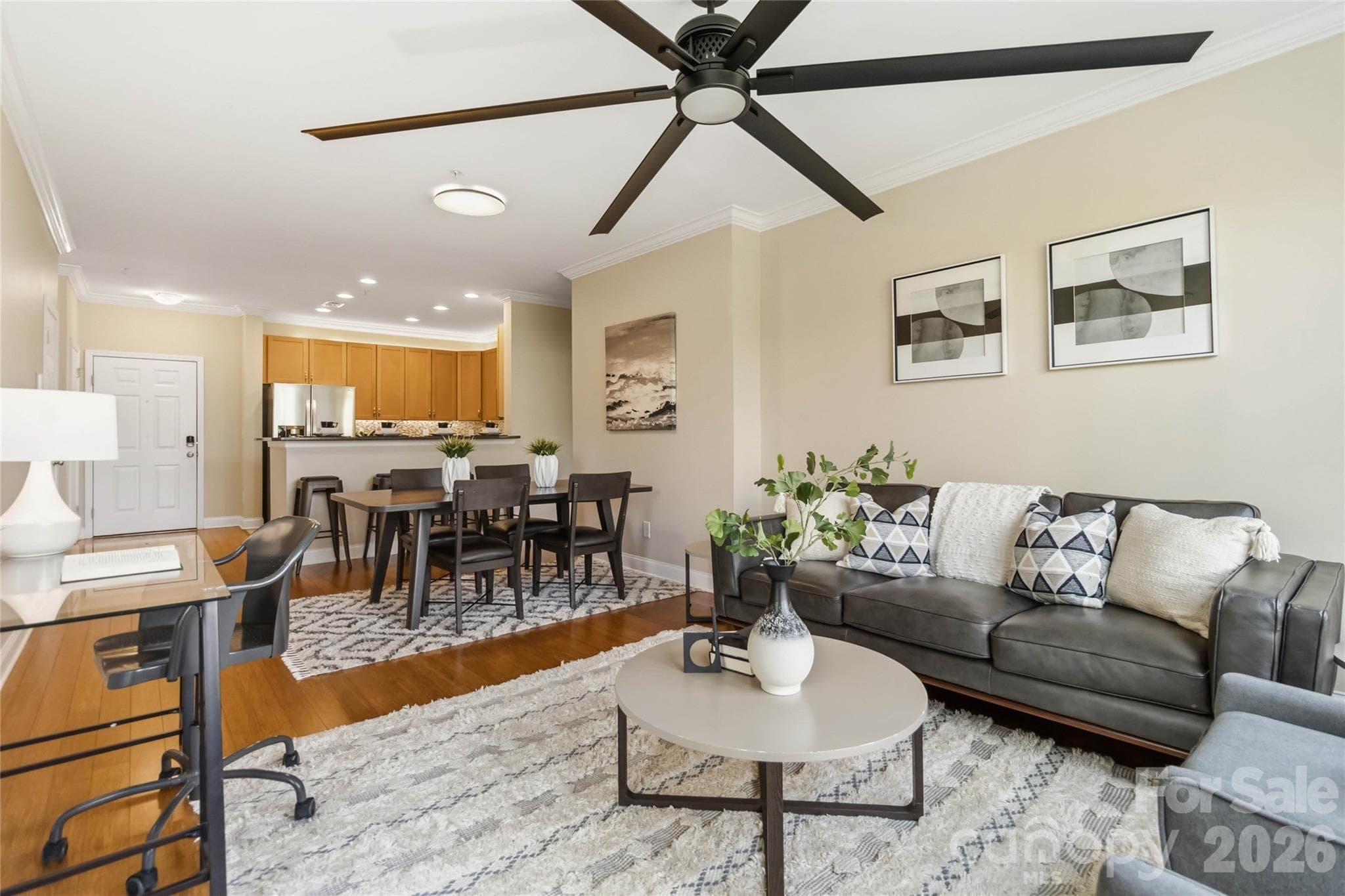 Staging has been removed, and the ceiling fan is now a smaller fan. - 1000 E Woodlawn Road, Charlotte