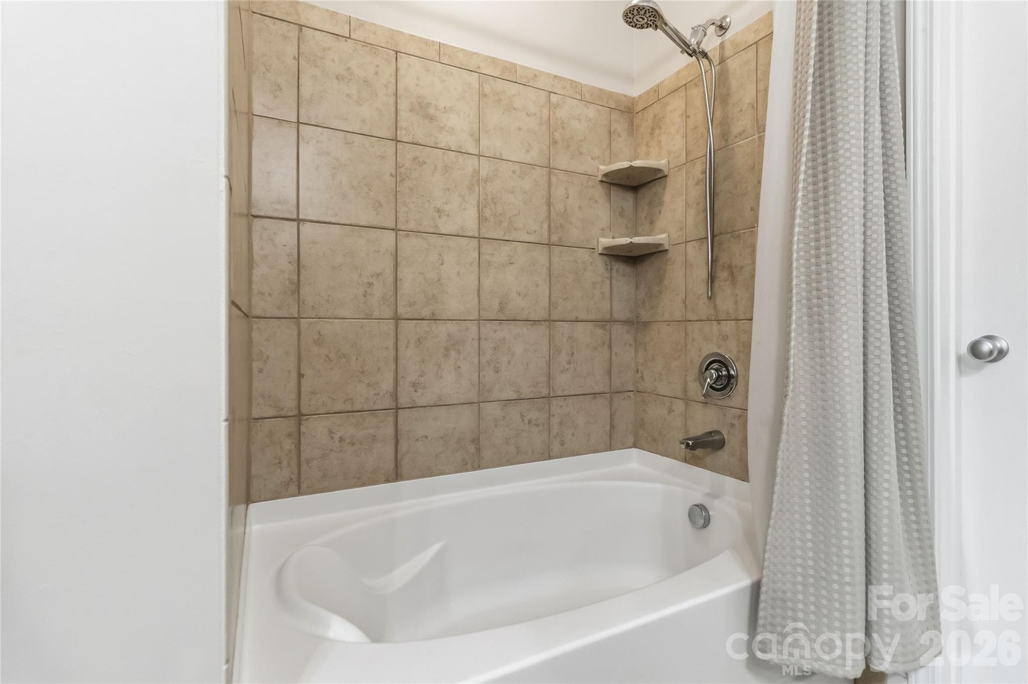 Soaker tub in the primary bathroom - 1000 E Woodlawn Road, Charlotte
