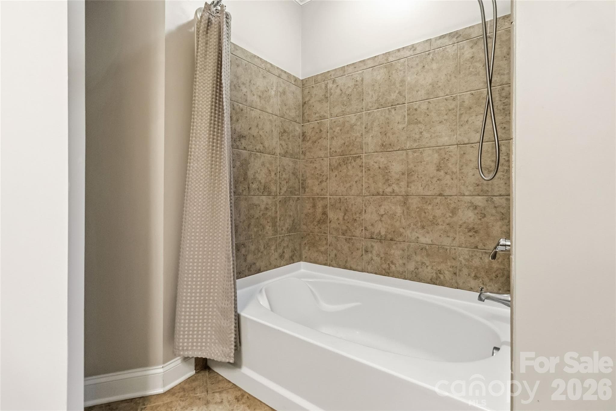 Soaker tub in the hall bathroom - 1000 E Woodlawn Road, Charlotte