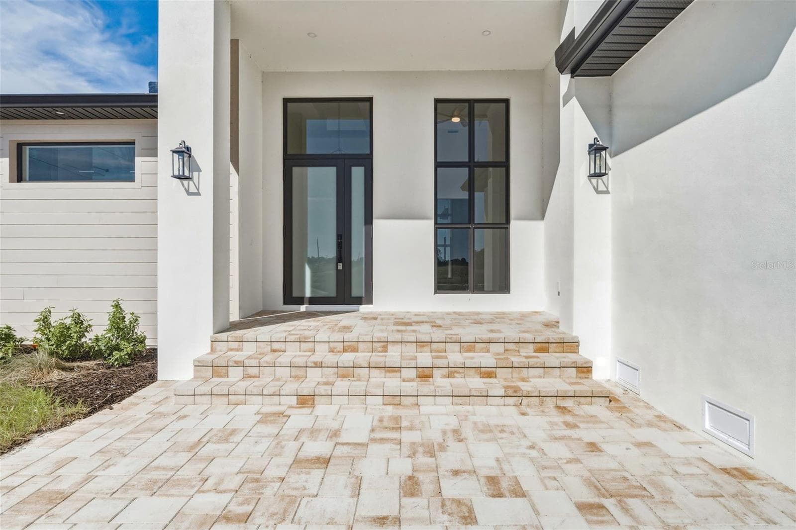 Grand Entryway Highlighting Modern Sophistication - 44 SUNFLOWER DR, PLACIDA