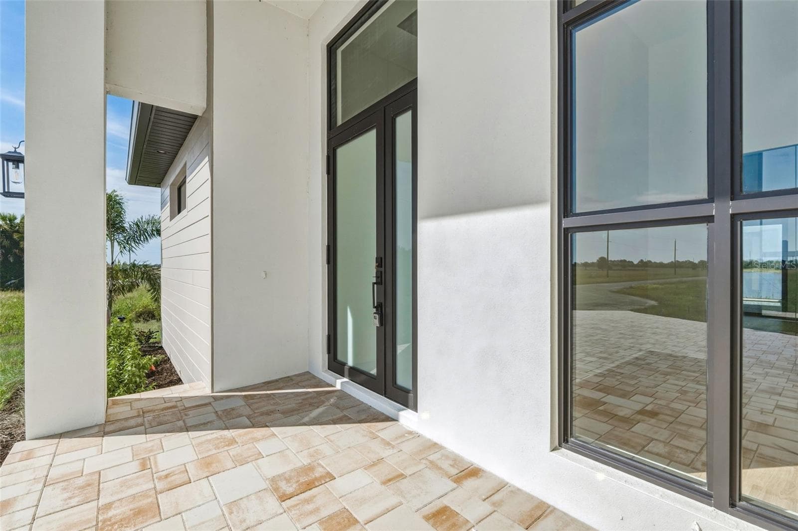 Grand Covered Entryway with Modern Windows - 44 SUNFLOWER DR, PLACIDA