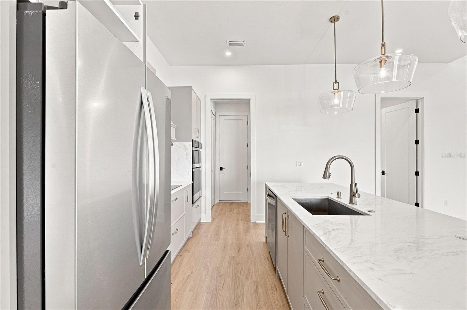 Luxury Kitchen with Waterfall Island & Waterfront Views - 44 SUNFLOWER DR, PLACIDA