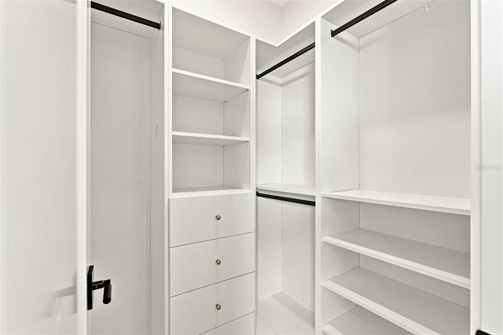 Custom Primary Walk-In Closet with Built in Storage - 44 SUNFLOWER DR, PLACIDA