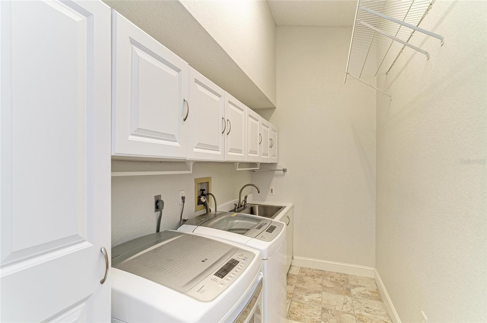 LAUNDRY ROOM - 7488 ELEANOR CIR, SARASOTA
