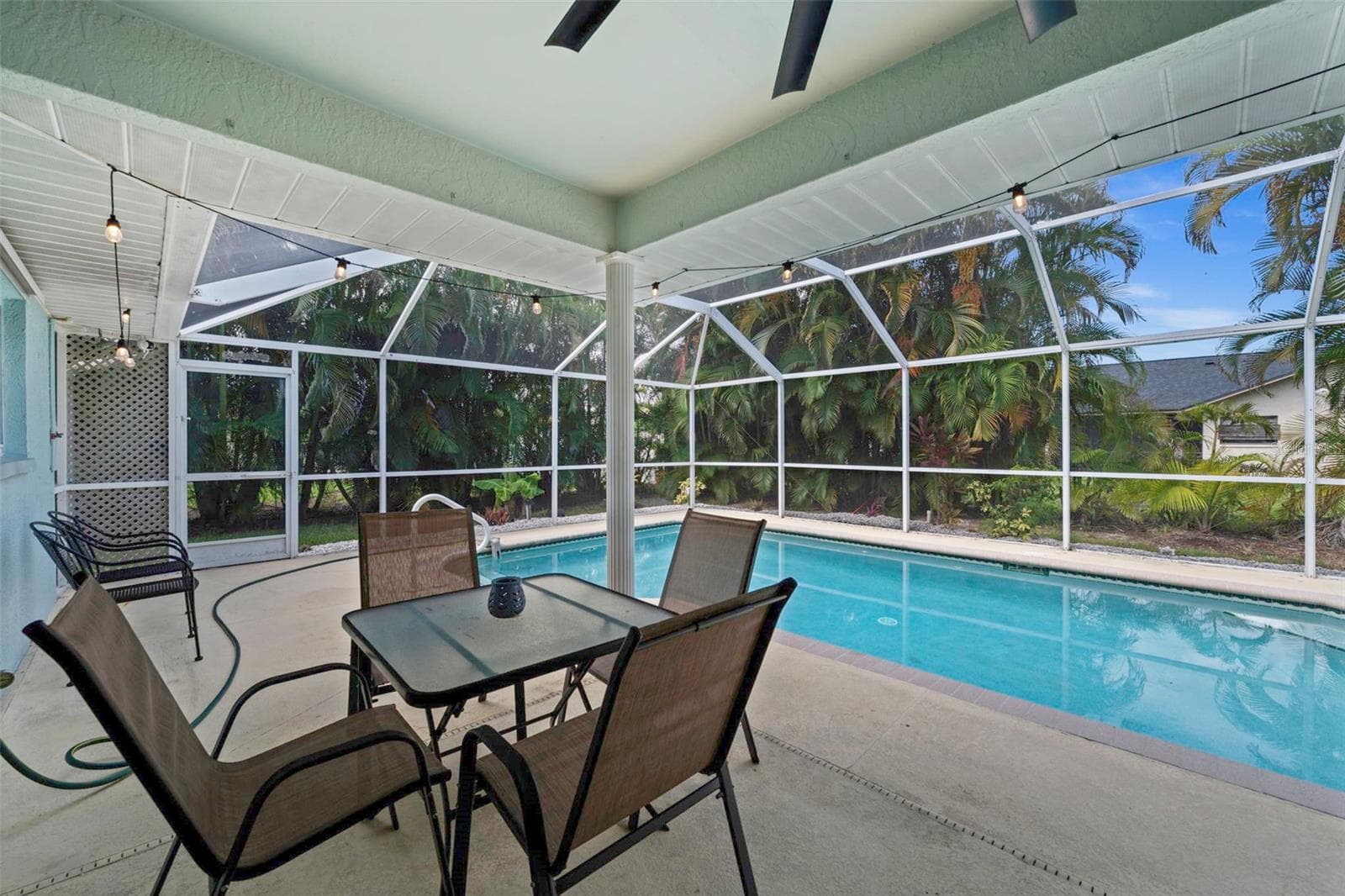 Relax in the lanai overlooking the pool - 3112 SW 16TH PL, CAPE CORAL
