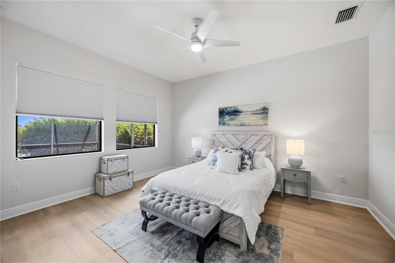 The primary bedroom is large and will easily accomodate a king sized bed and nightstands and dresser - 23781 WAVERLY CIR, VENICE