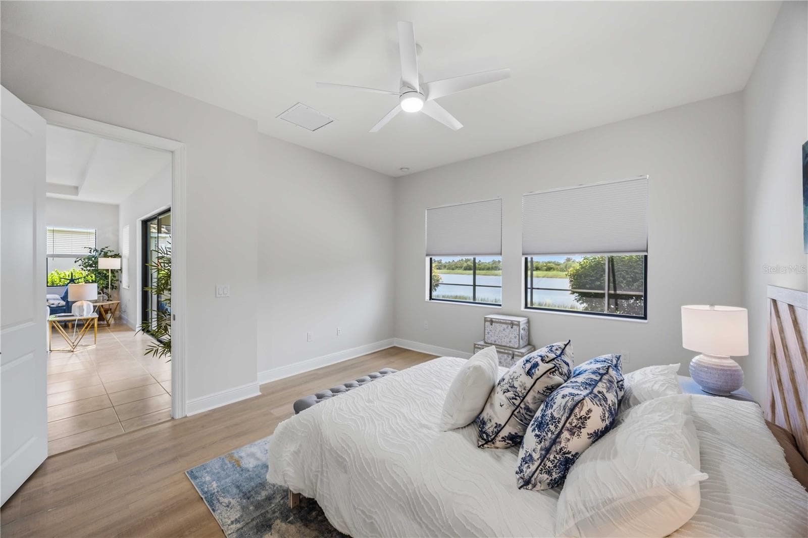 he primary bedroom is large and will easily accomodate a king sized bed and nightstands and dresser - 23781 WAVERLY CIR, VENICE