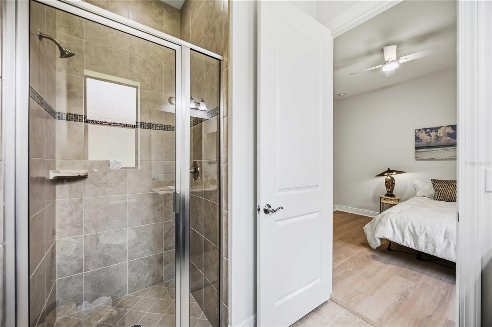 The ensuite in guest 2 has a walk in shower - 23781 WAVERLY CIR, VENICE