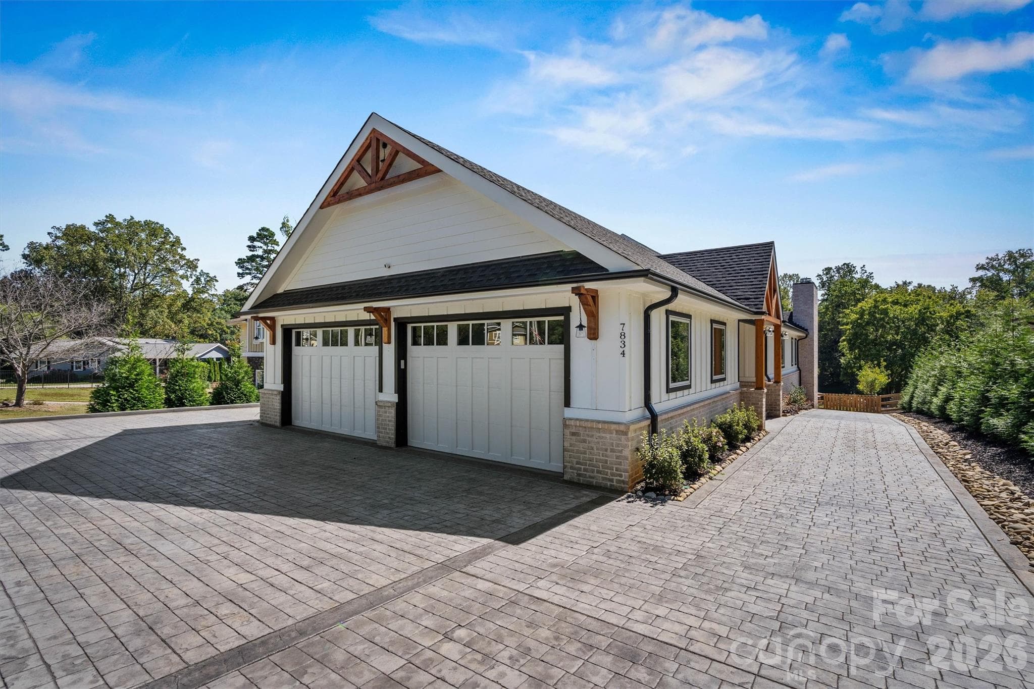 815 sq ft garage with epoxy floors and sink. Plenty of parking for visitors! - 7834 Green Cove Court, Denver