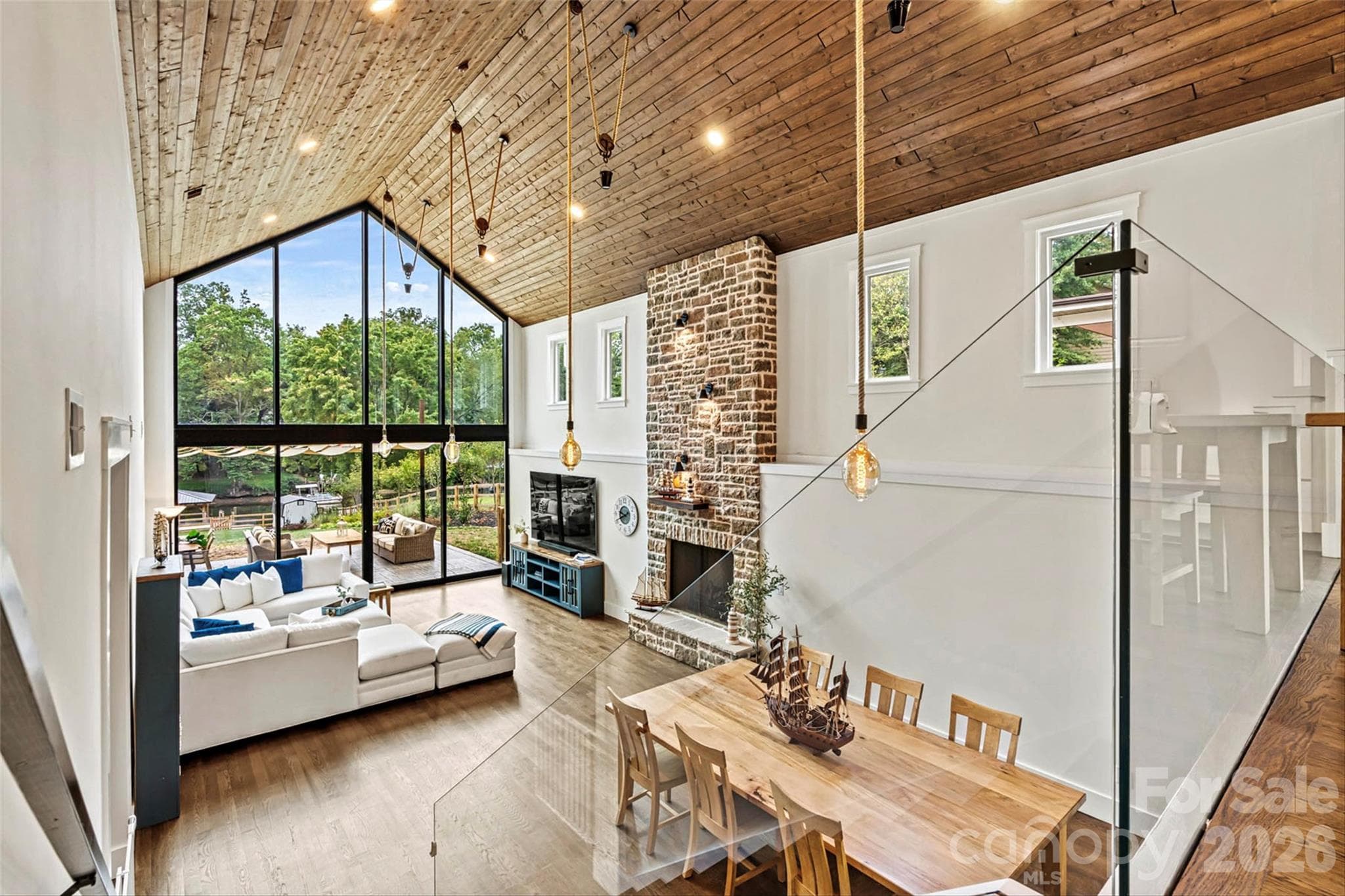 Resort style great room with plenty of natural light! - 7834 Green Cove Court, Denver