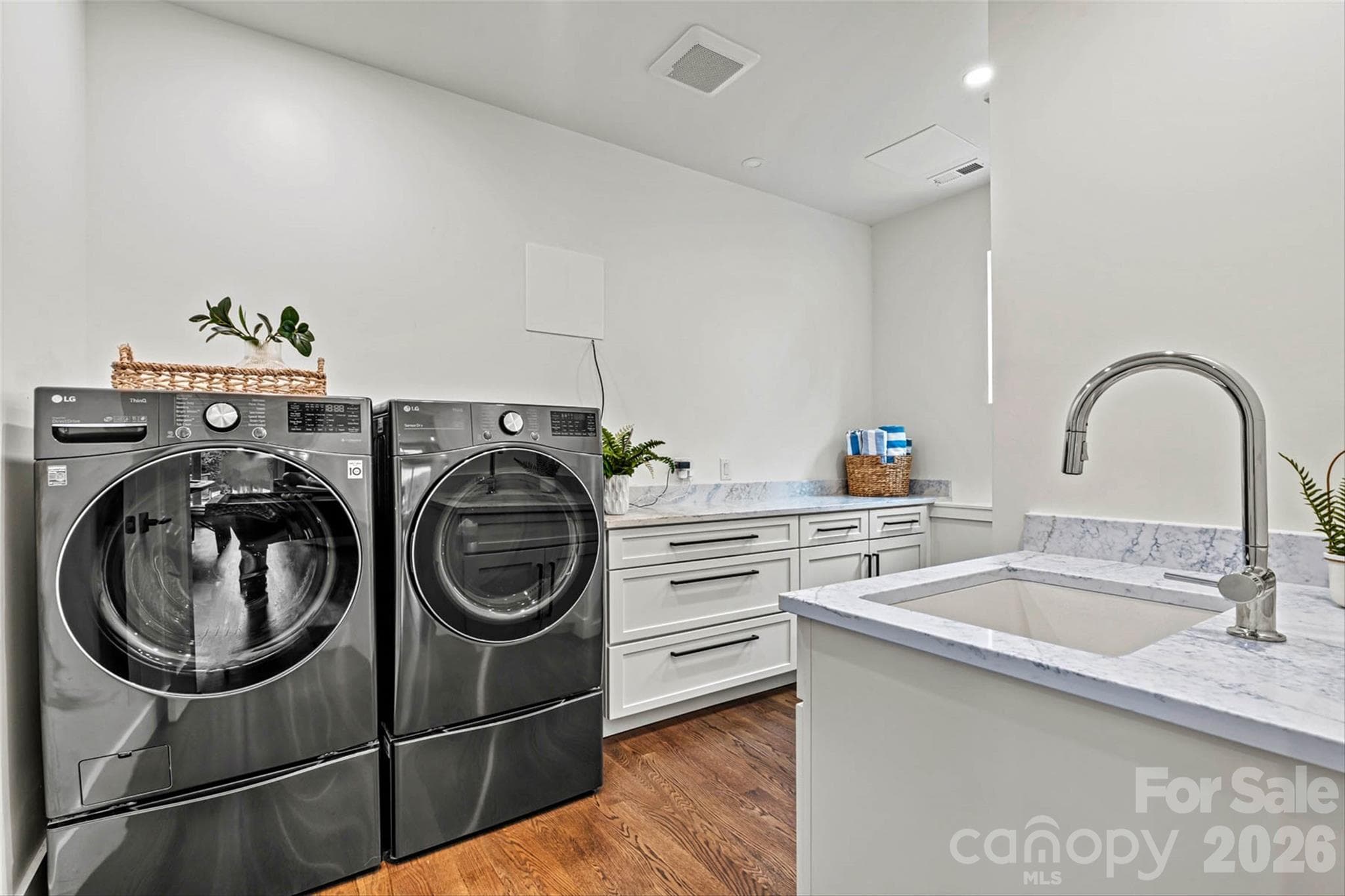 Lower level laundry off game room. - 7834 Green Cove Court, Denver