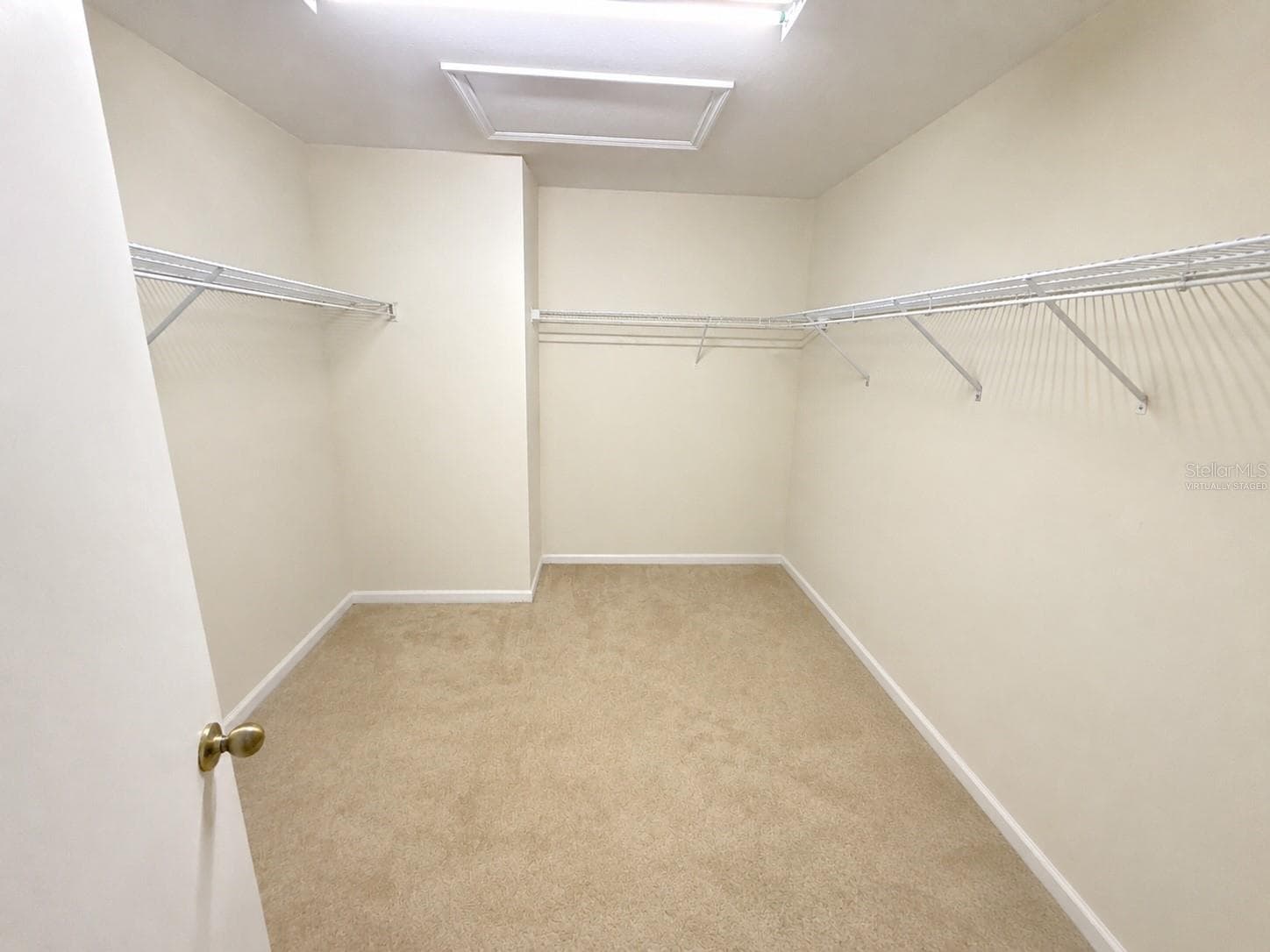 Master closet. Virtually staged - 21468 DAWSON AVE, PORT CHARLOTTE