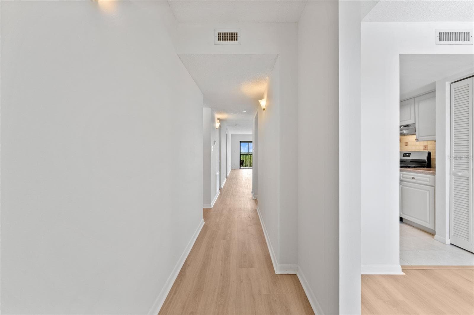 Upon entering unit, notice new LVP flooring and freshly painted throughout. - 5400 PARK ST N #511, ST PETERSBURG