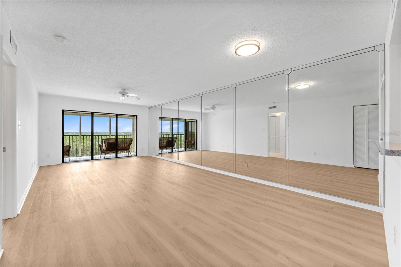 Large combo living/dining room- new flooring - 5400 PARK ST N #511, ST PETERSBURG
