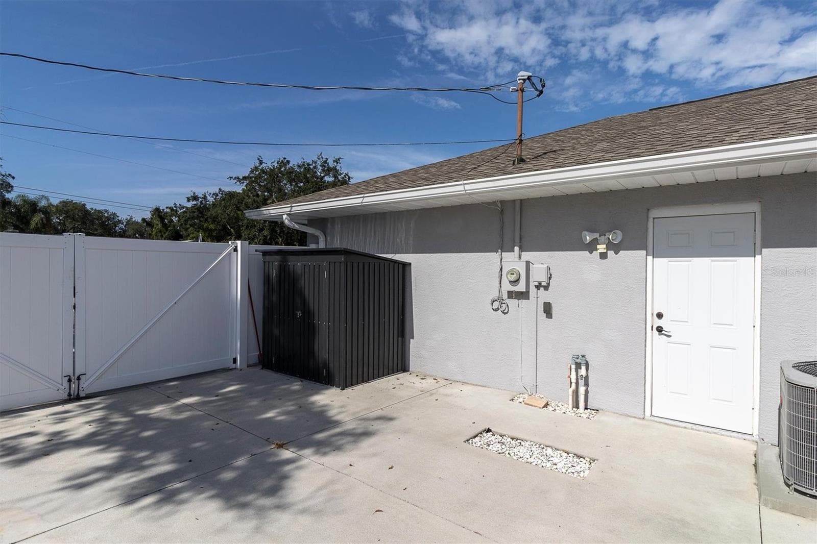 In back of the driveway gate and off the side of the garage you will find another large area to park your boat, rv, work van, or any other toys you have! - 8345 APPLE ORCHARD RD, SPRING HILL