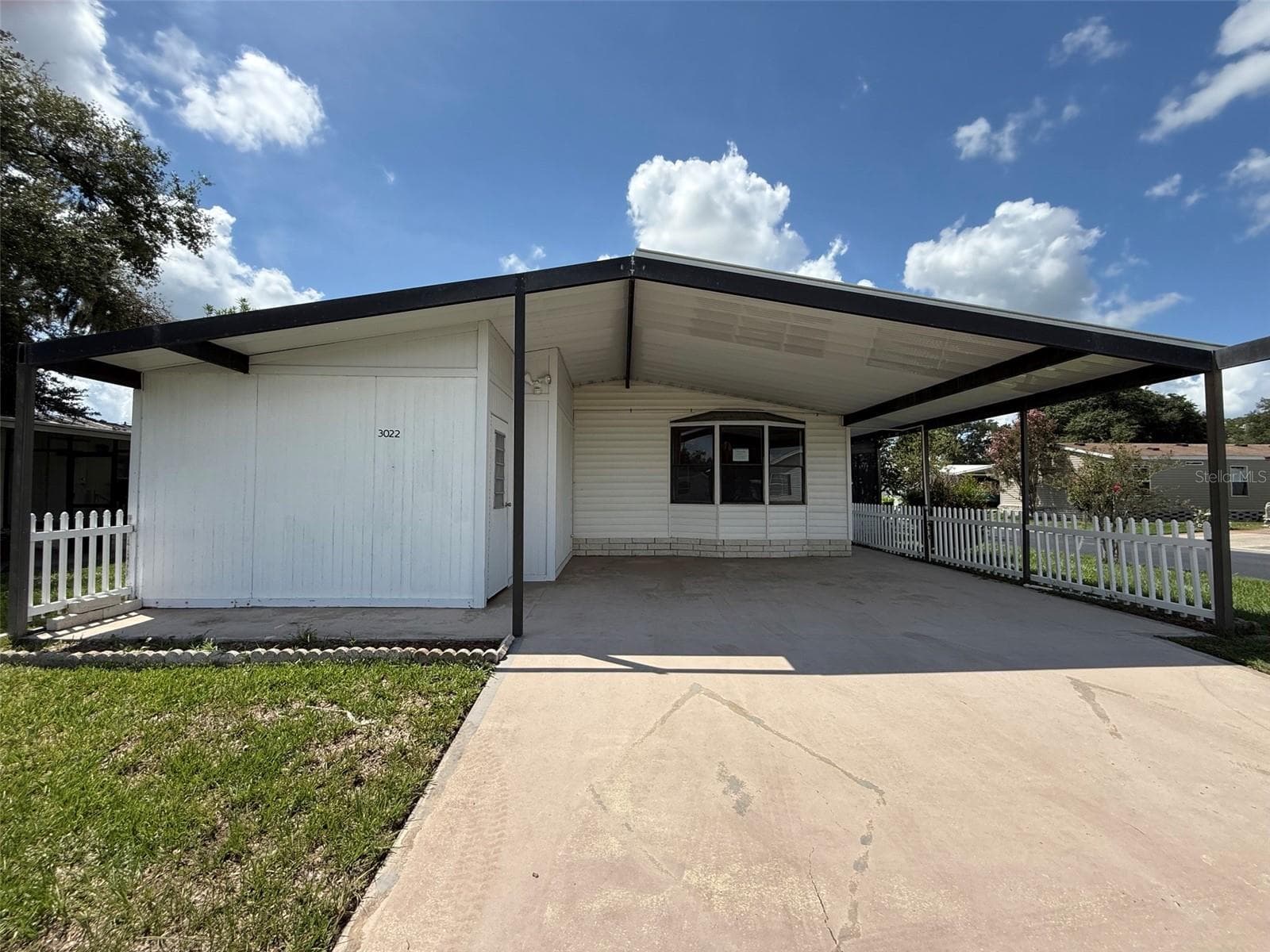 Manufactured Home at 3022 SHORT LEAF ST, WESLEY CHAPEL, photo 2 of 13