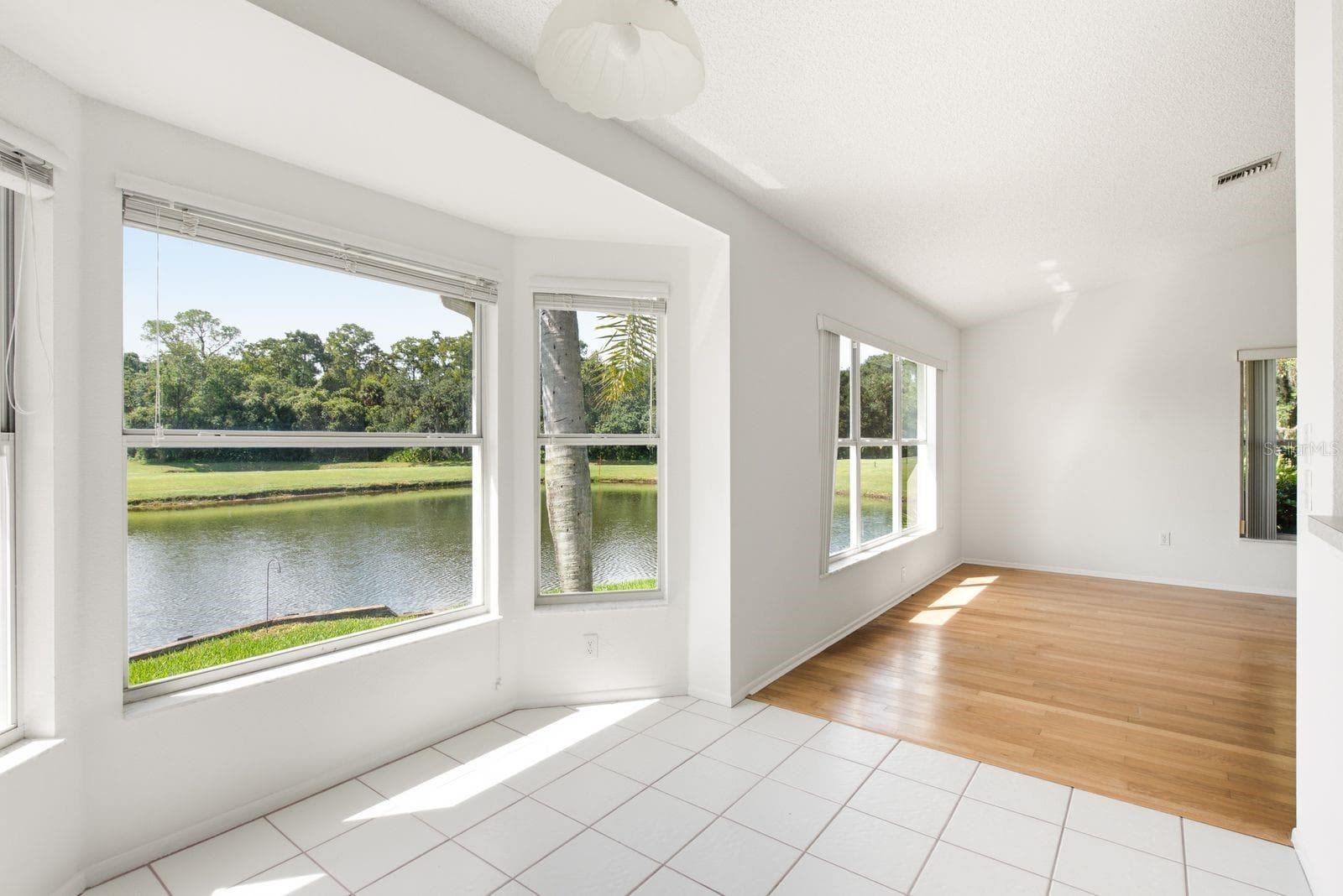 Dining / additional conversation area overlooking the 5th Green - 6639 SUN POINT CT, NEW PORT RICHEY