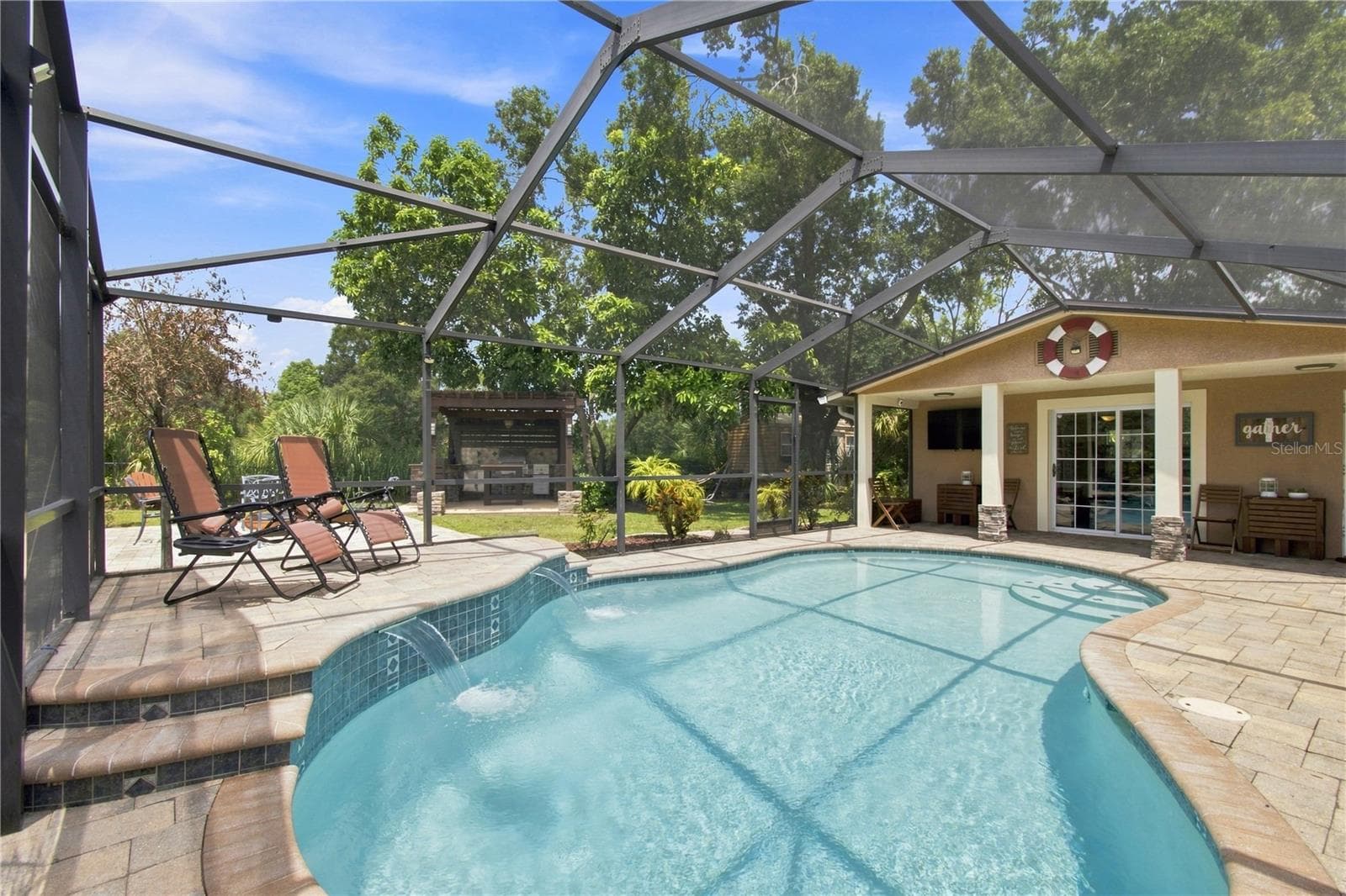 Sparkling pool with water cascade feature - 9020 AUBURN WAY, TAMPA