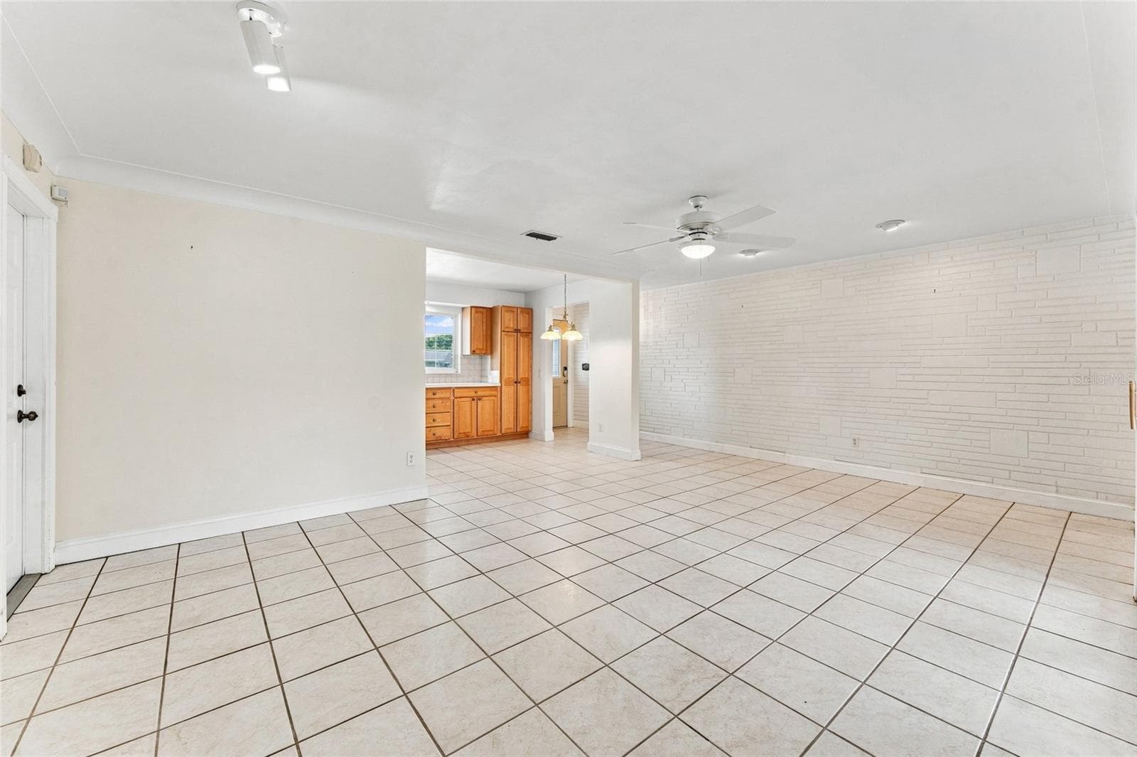 living room towards kitchen - 1773 LONDON LN, CLEARWATER