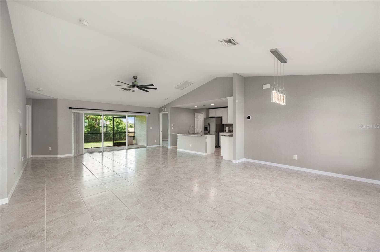 Spacious Living Room with Neutral Tile Flooring - 4302 NW 32ND ST, CAPE CORAL